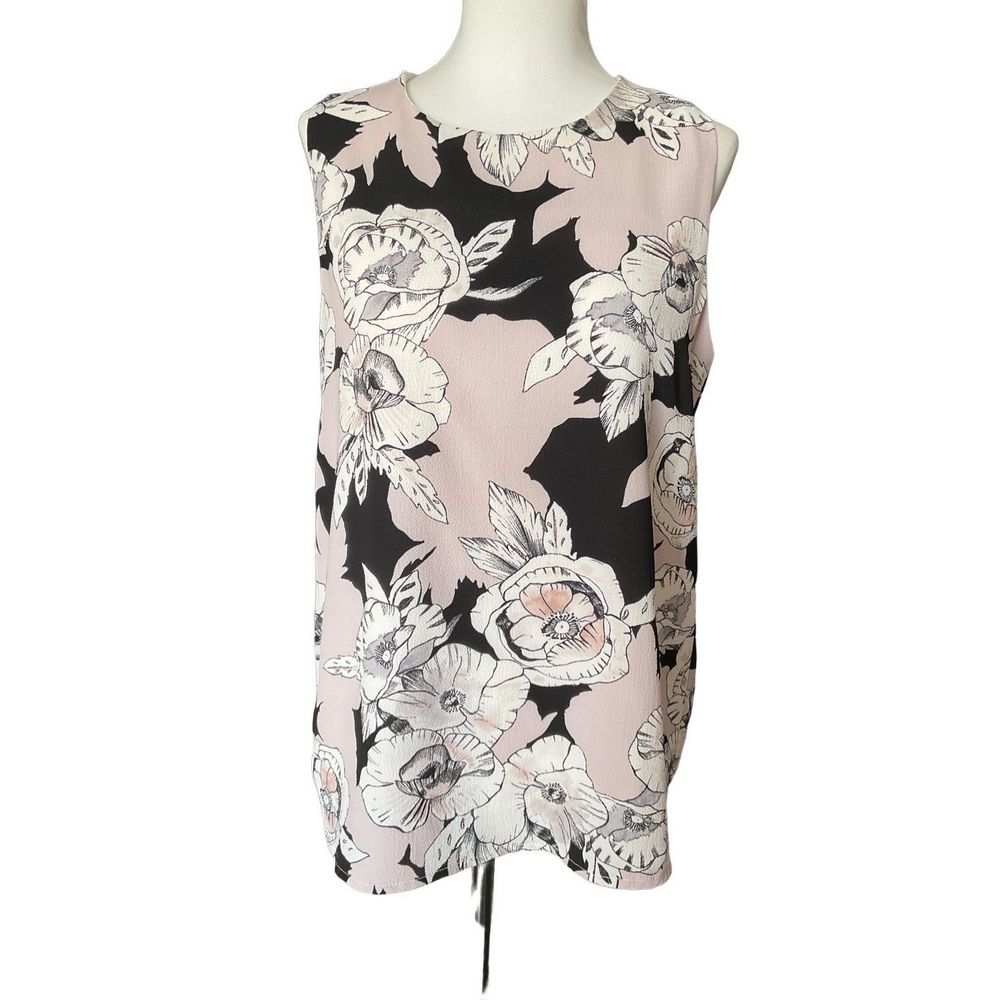 C&E Sleeveless Pale Pink Black and White floral print Top. Single button upper b